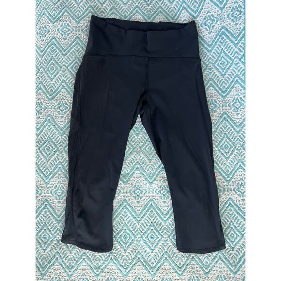 LULULEMON ATHLETICA BLAK CROPPED LEGGINGS WITH LACE ON SIDES WOMEN’S SIZE 8 - Picture 1 of 6